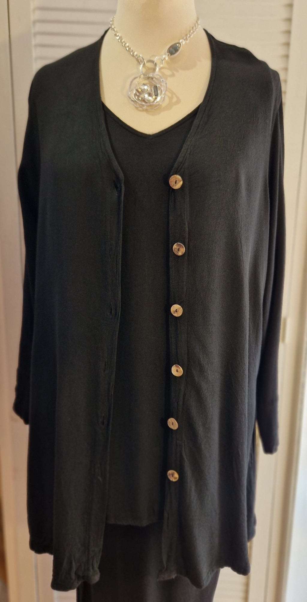 Our mannequin is modelling Belladonna crepe collarless jacket in black for Froxx Clothing