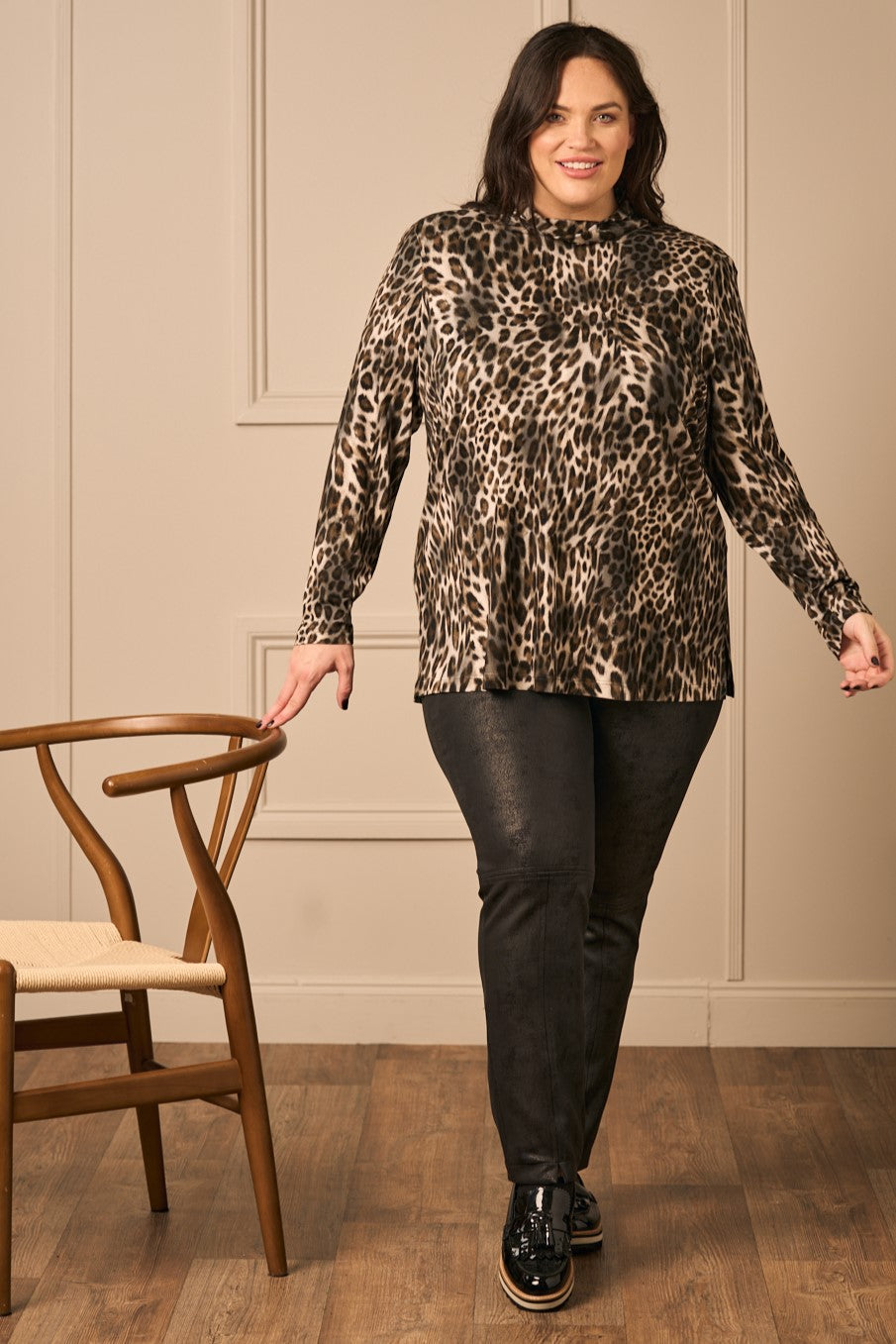 Our model is wearing Mona Lisa jersey polo top in animal print for Froxx Clothing who specialise in plus sizes