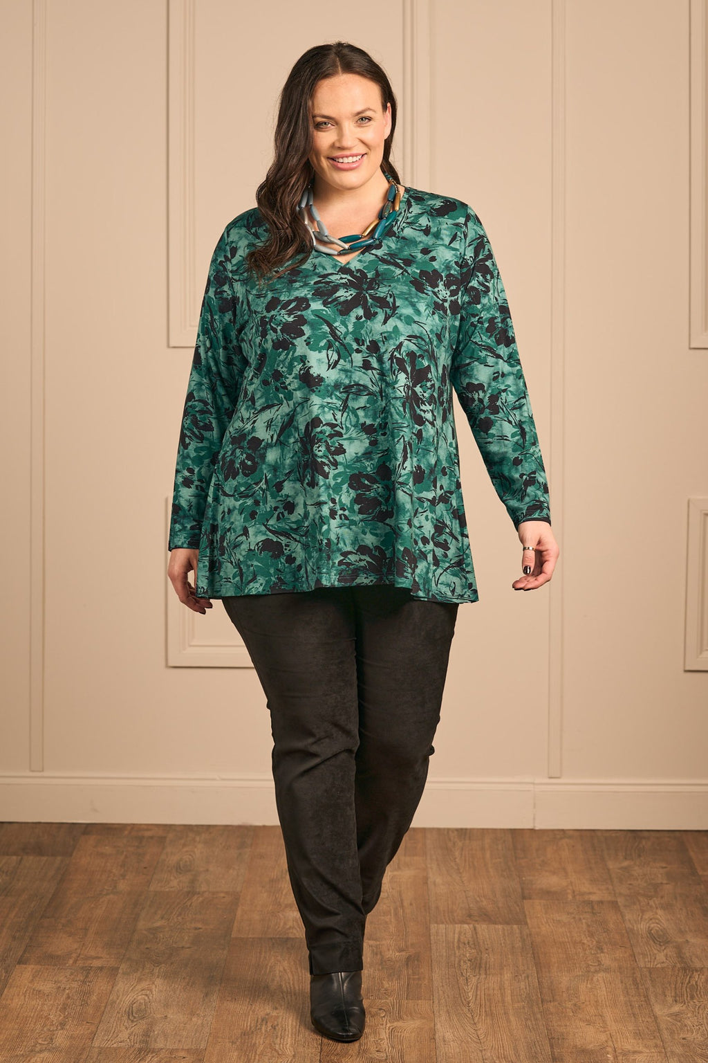 Our model is wearing KJ Brand jersey floral tee in jade for Froxx Clothing plus size specialists in Hertfordshire