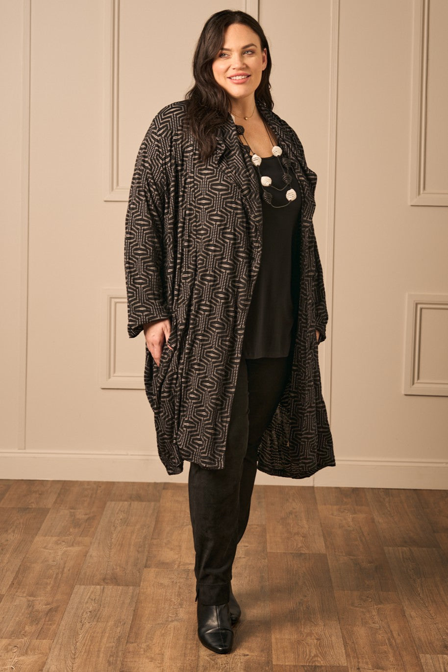 Our model is wearing AKH Vanessa jacquard jersey jacket in black for Froxx CLothing plus sizes