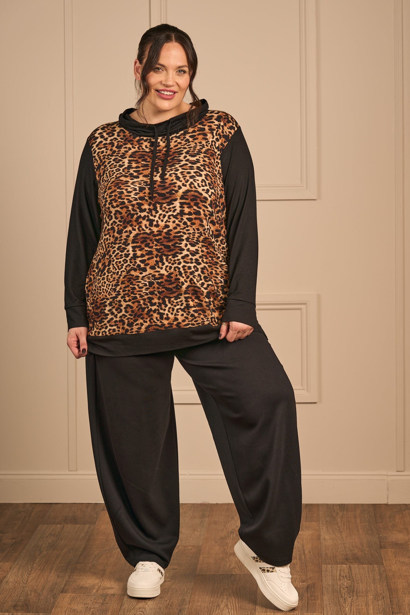 Our model is wearing KJ Brand jersey harem trousers in black for Froxx Clothing plus sizes