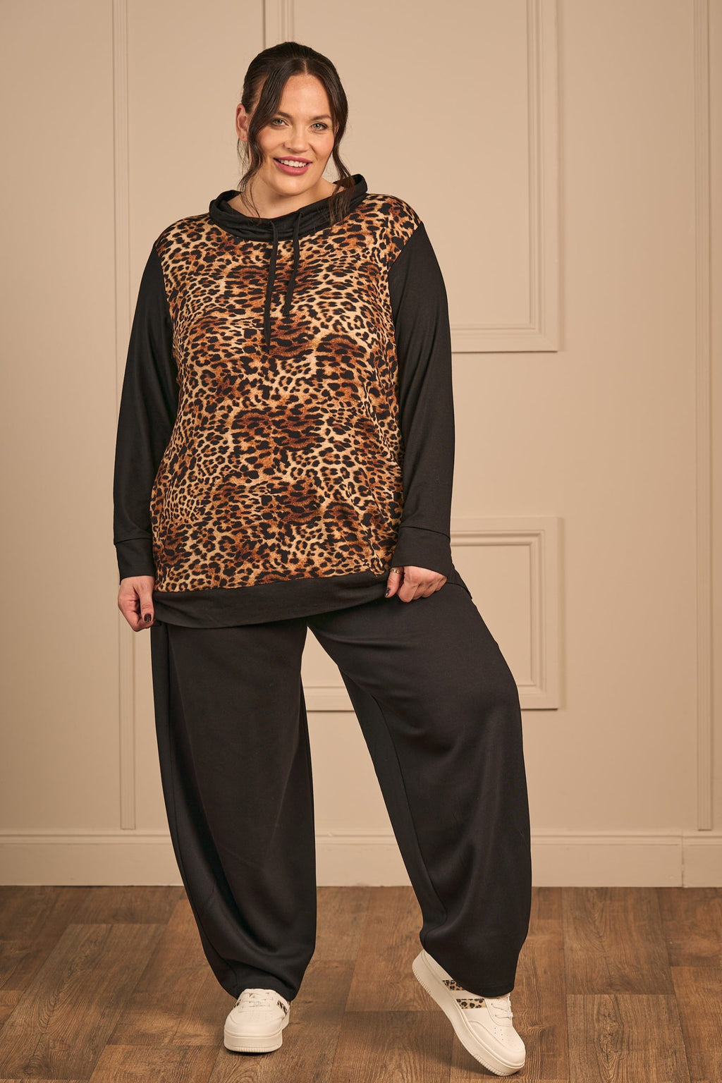 Our model is wearing KJ Brand jersey harem trousers in black for Froxx Clothing plus sizes