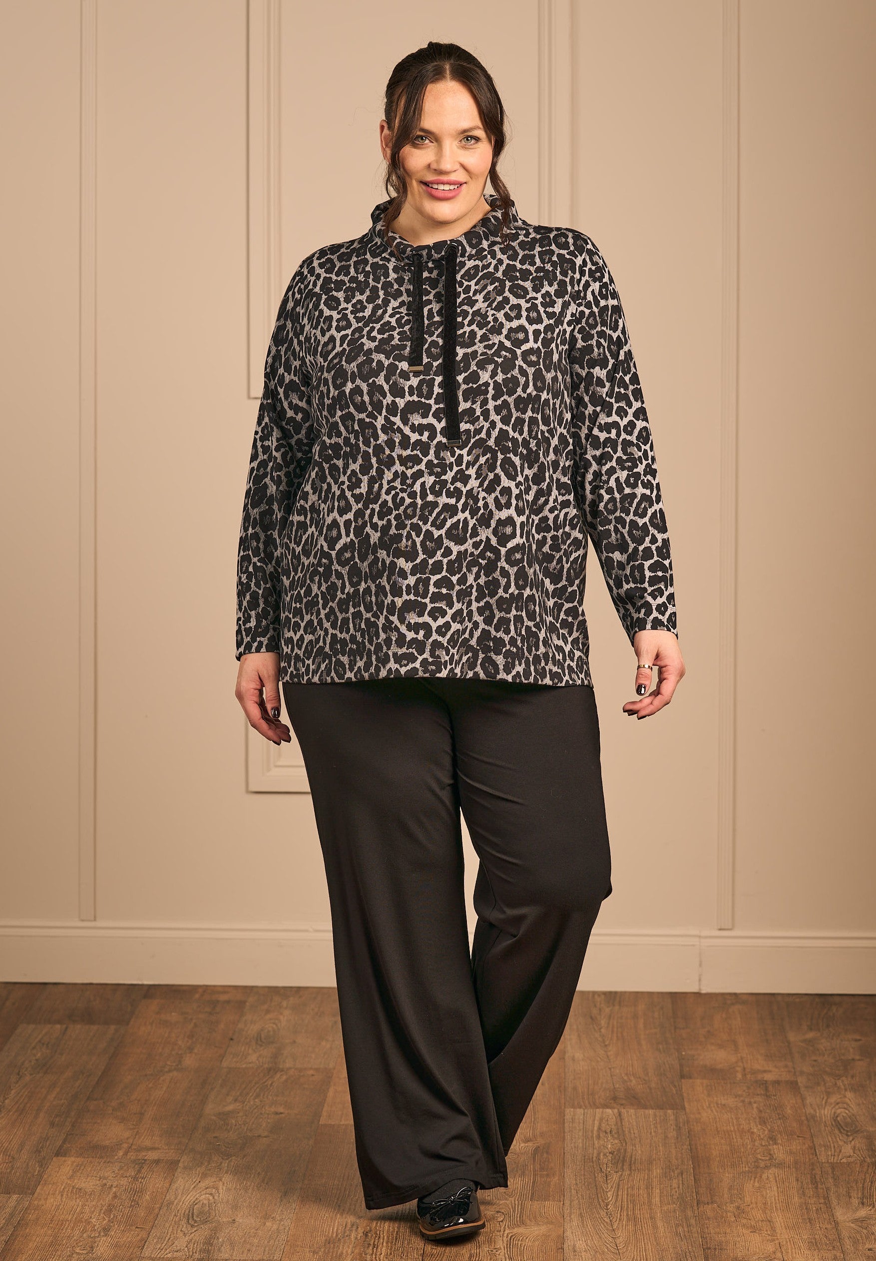 OUr model is wearing Via Appia leisure top in grey animal print for Froxx Clothing who specialise in plus sizes