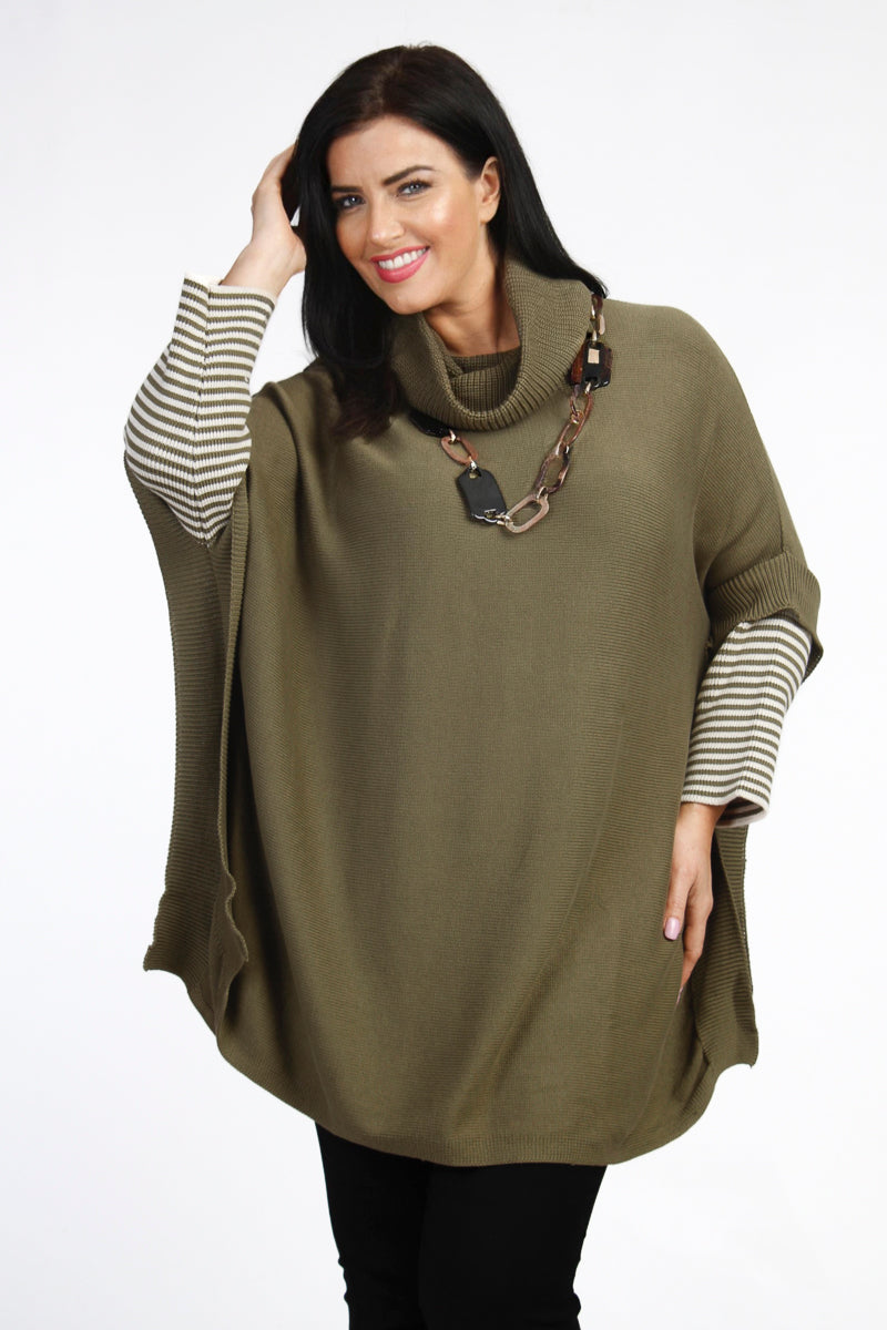 Our model is wearing Orientique knit cowl poncho in khaki for Froxx Clothing