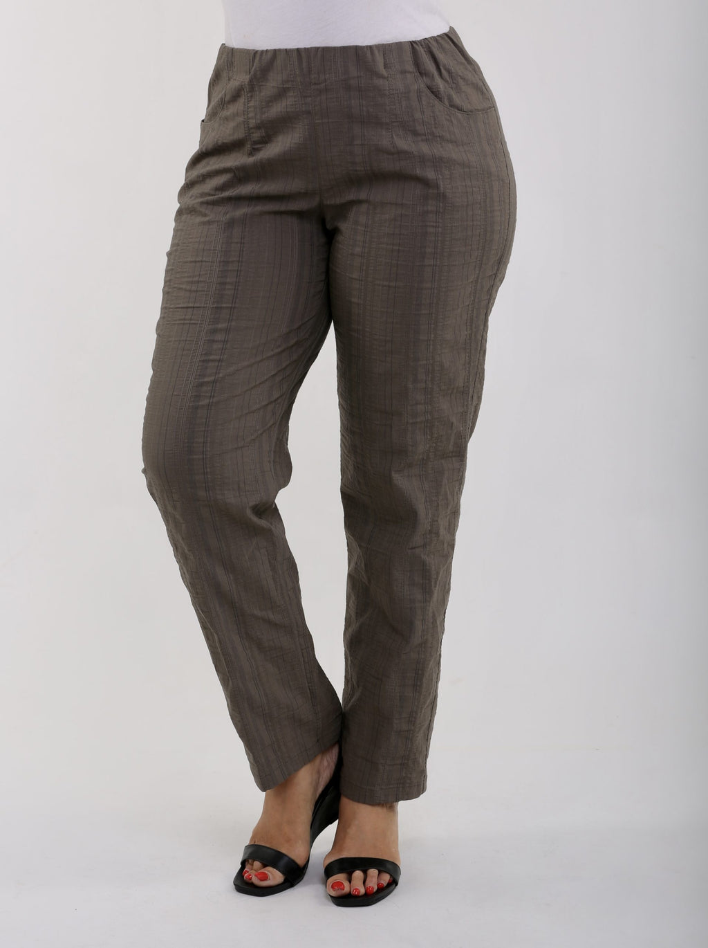 lady is wearing cool summer khaki trousers by KJ Brand
