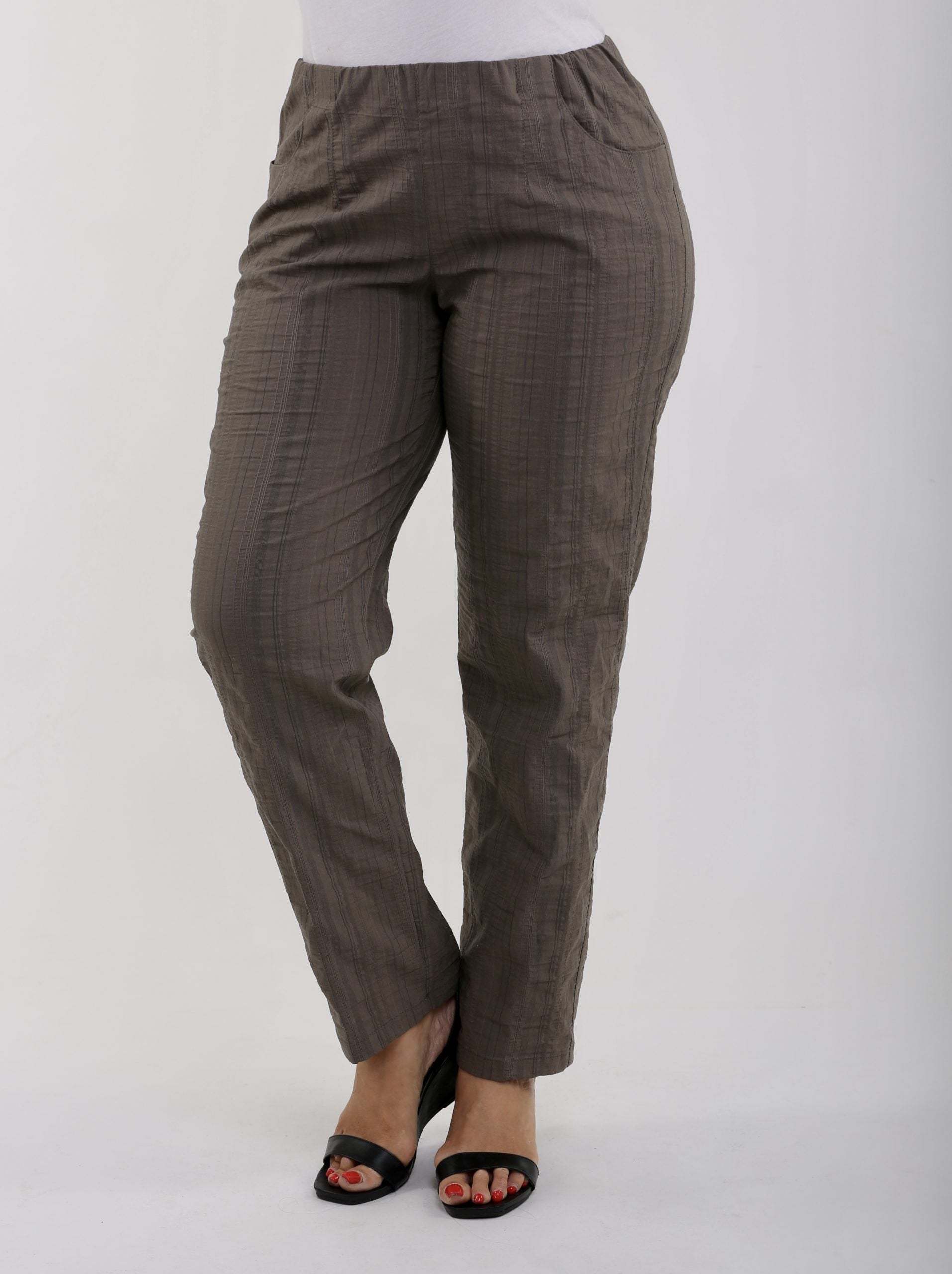 lady is wearing cool summer khaki trousers by KJ Brand