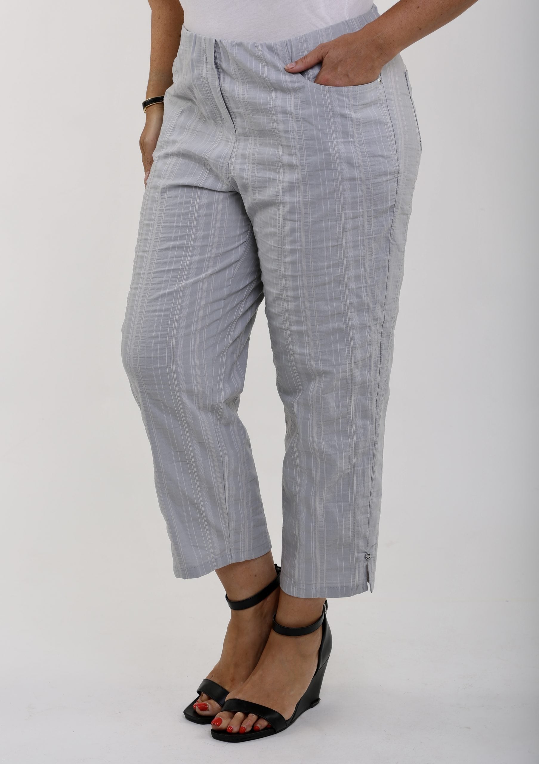 Lady wearing silver grey summer trousers by KJ Brand