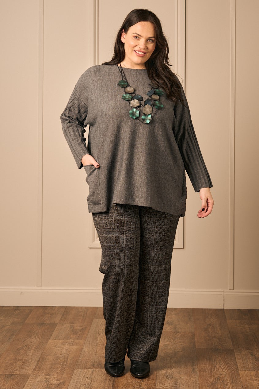 Our model is wearing Noen batwing jumper in Anthracite for Froxx Clothing plus sizes