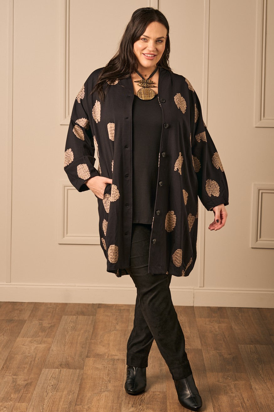 Our model is wearing Noen jersey jacket in black for Froxx Clothing plus sizes