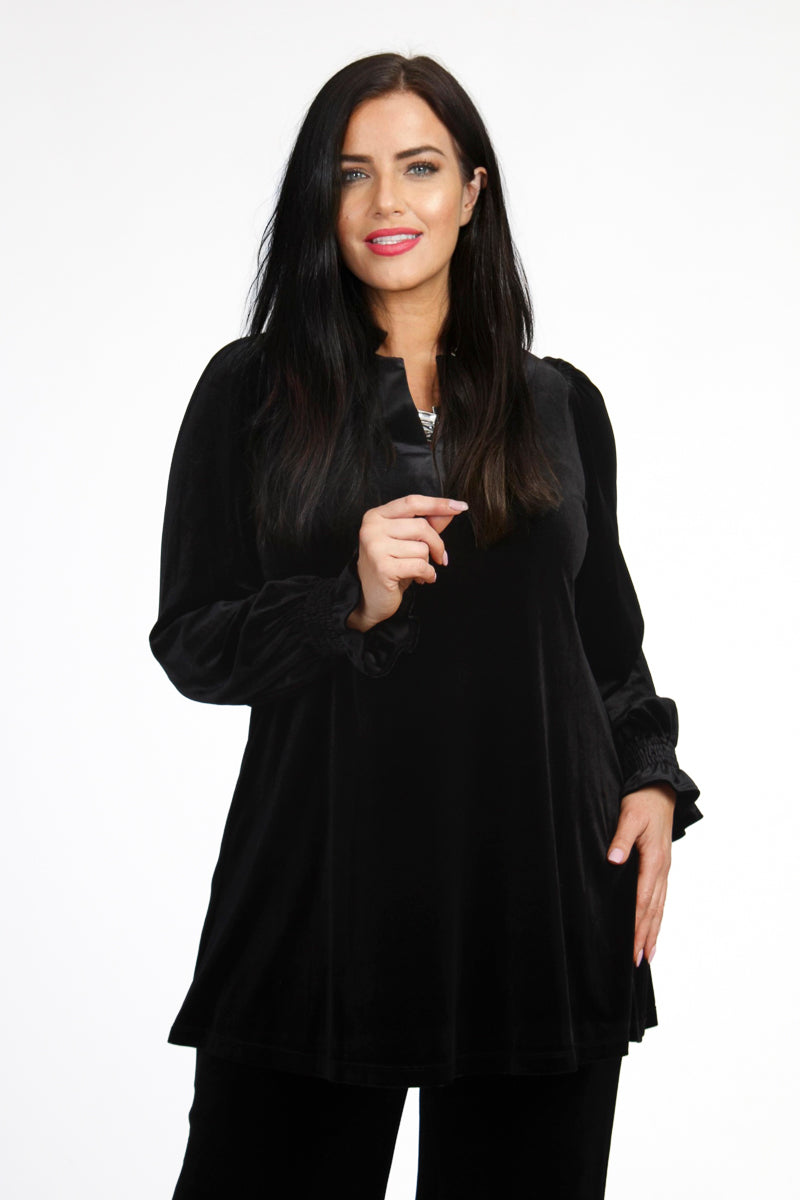 Our model is wearing Yoek velvet tunic in black for Froxx Clothing