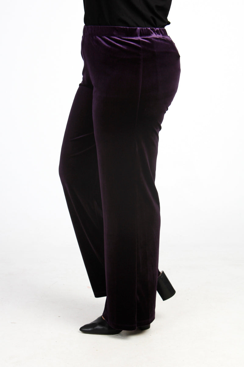 Our model is wearing Yoek velvet palazzos in aubergine for Froxx Clothing