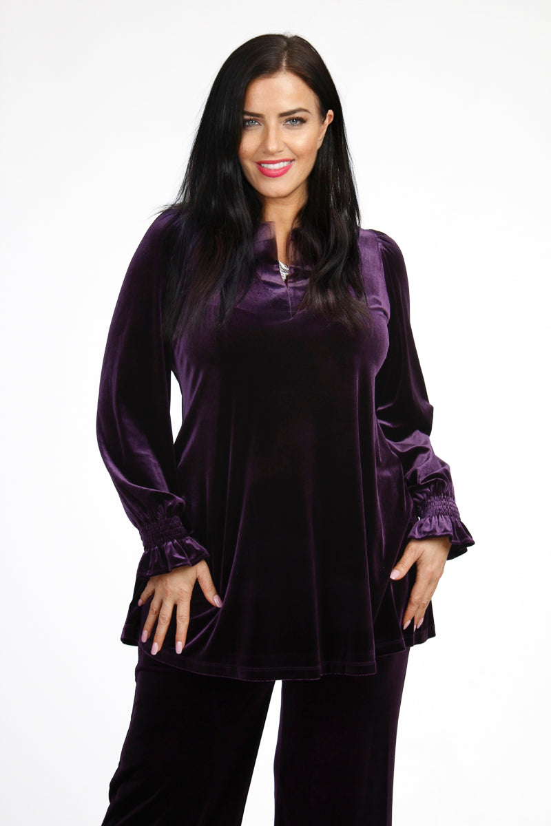 Our model is wearing Yoek velvet tunic in aubergine for Froxx Clothing