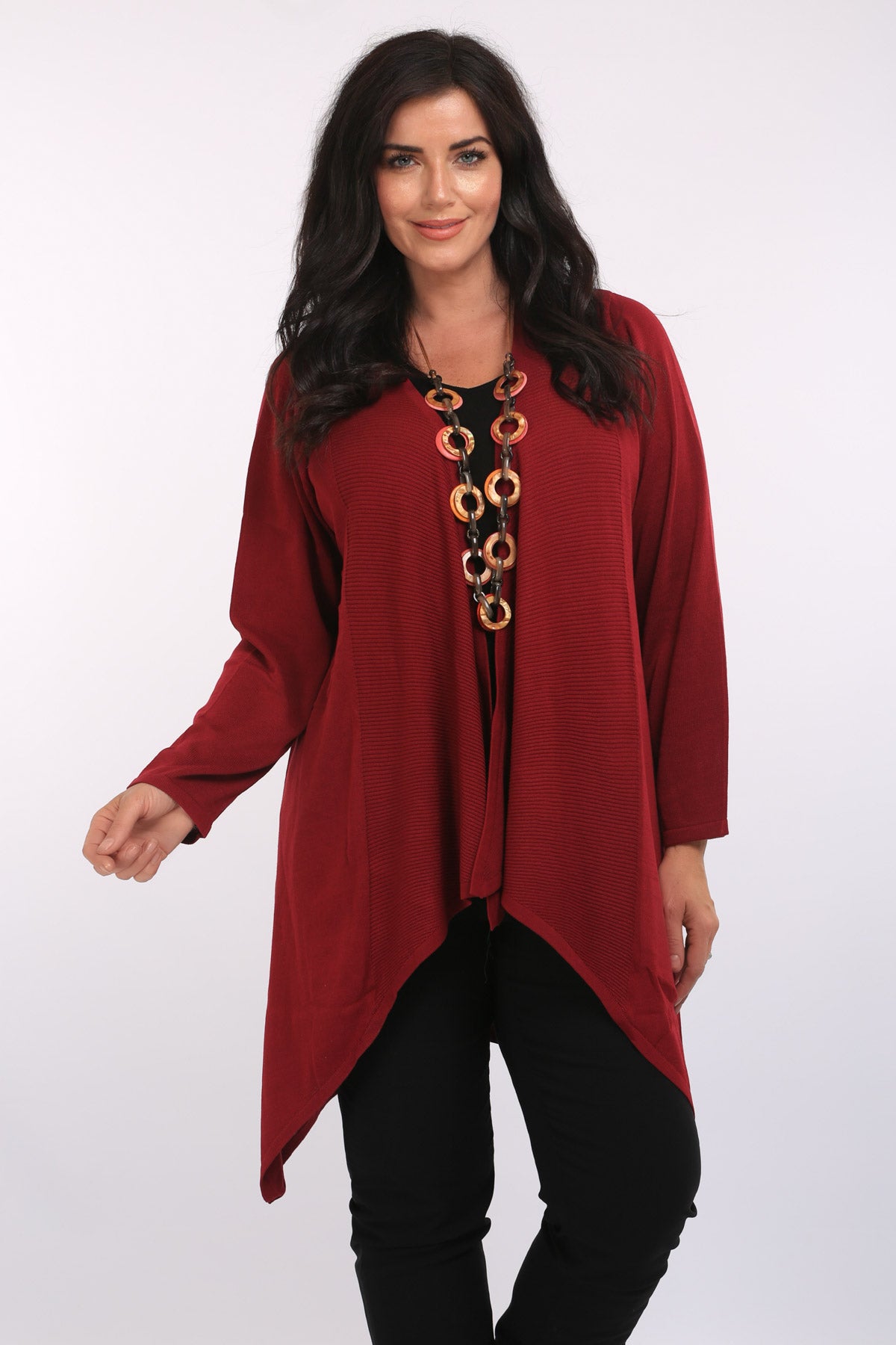 Woman is wearing Amicia waterfall knit cardi by Pont Neuf