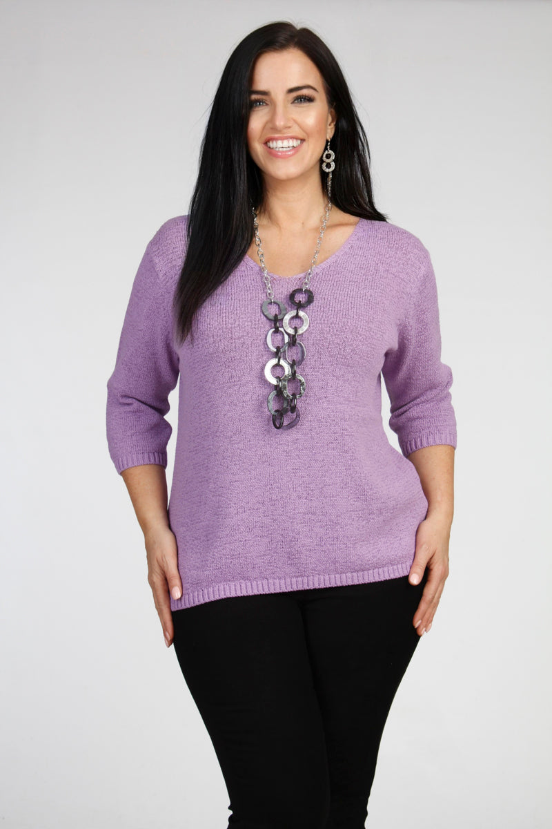 Our model is wearing Via Appia V neck jumper in lilac for Froxx Clothing