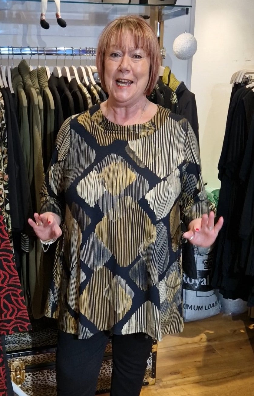 Our model is wearing Pont Neuf Jola Tea jersey lines tunic in gold and black for Froxx Clothing